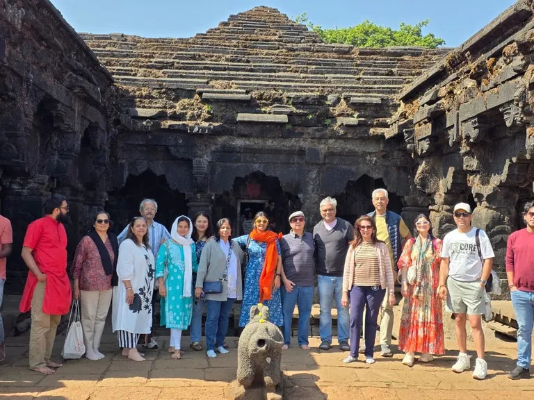 The retreat group gathered at an ancient stone temple in Old Mahabaleshwar