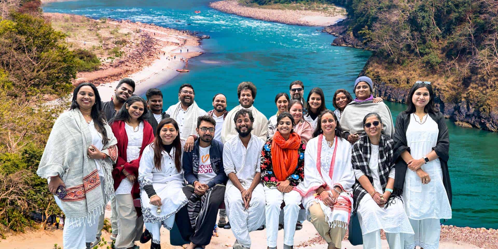 A Yoga Kiran group on the banks of the Ganga, December 2019